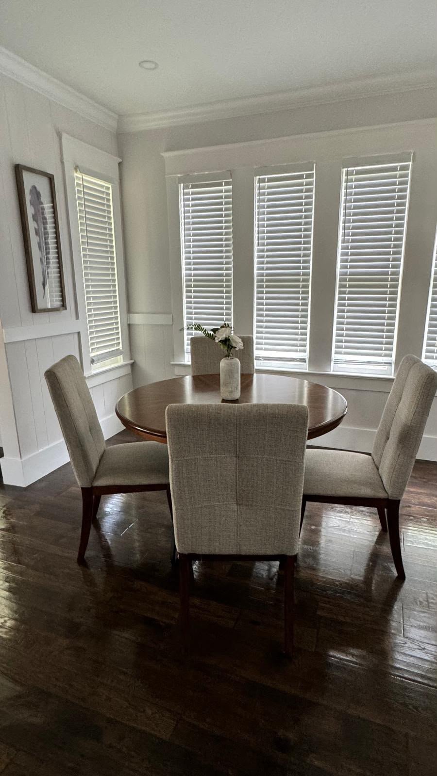 Dusted dining nook with round table and chairs